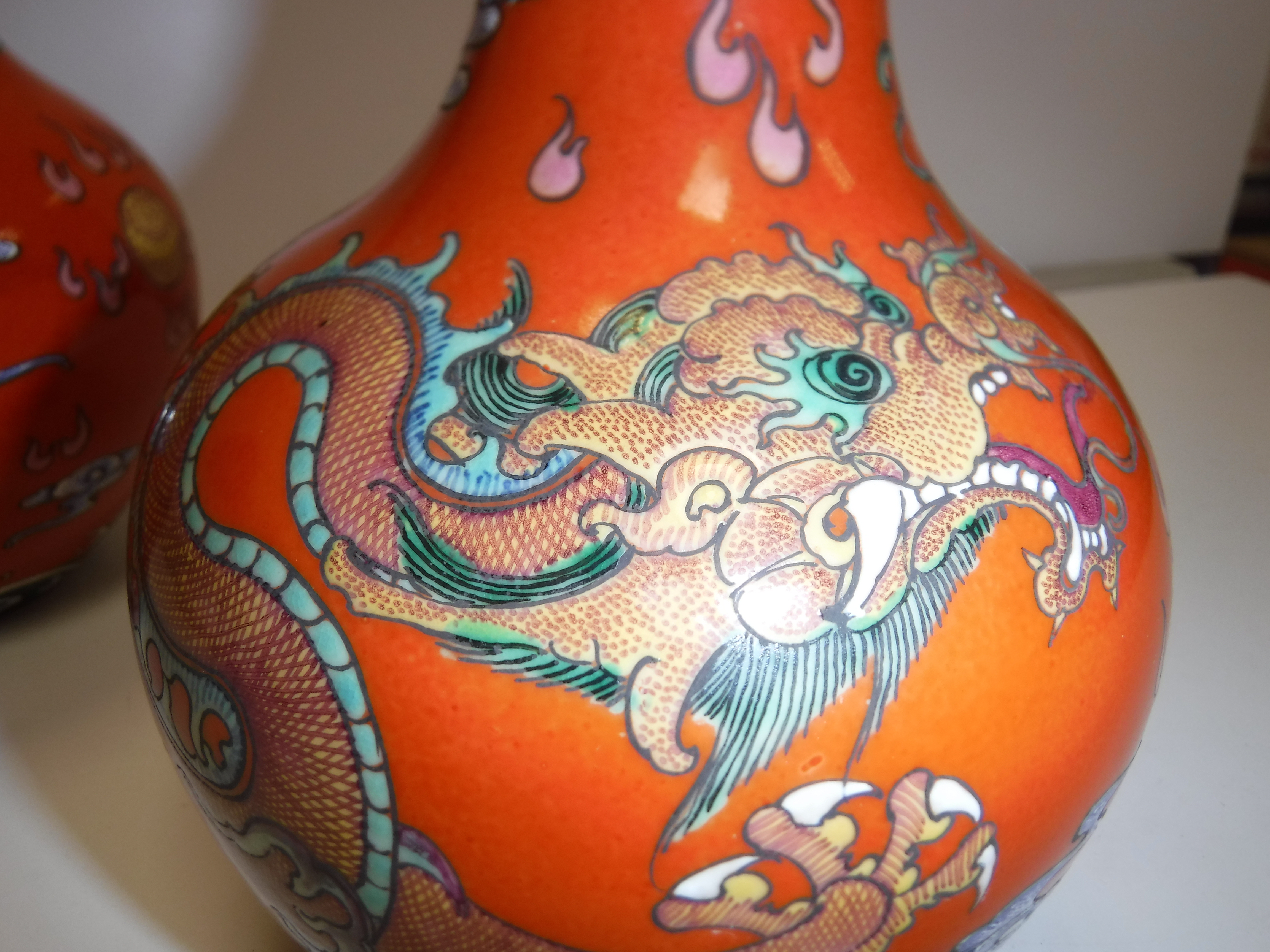 A pair of circa 1900 Chinese oxide red ground five toed dragon decorated vases bearing blue - Image 5 of 18