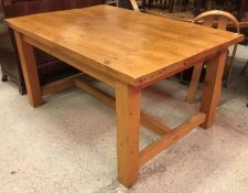 A modern pine farmhouse style kitchen table,