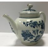 An 18th Century Worcester bullet-shaped teapot decorated with two birds and fence pattern both
