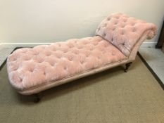 A Victorian pink velour upholstered and buttoned day bed by Howard & Sons of Berners Street, London,