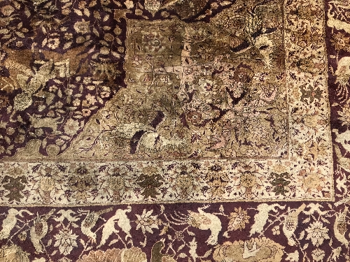 An early 20th Century Agra North India carpet with centre medallion on a wine-coloured ground, - Image 72 of 103