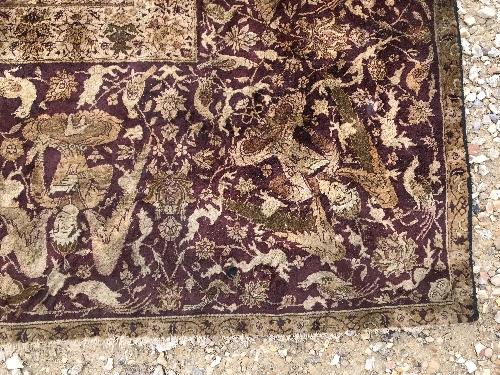 An early 20th Century Agra North India carpet with centre medallion on a wine-coloured ground, - Image 84 of 103