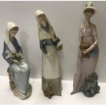 A collection of Lladro figurines to include "Girl with lamb in one hand and basket of onions in the