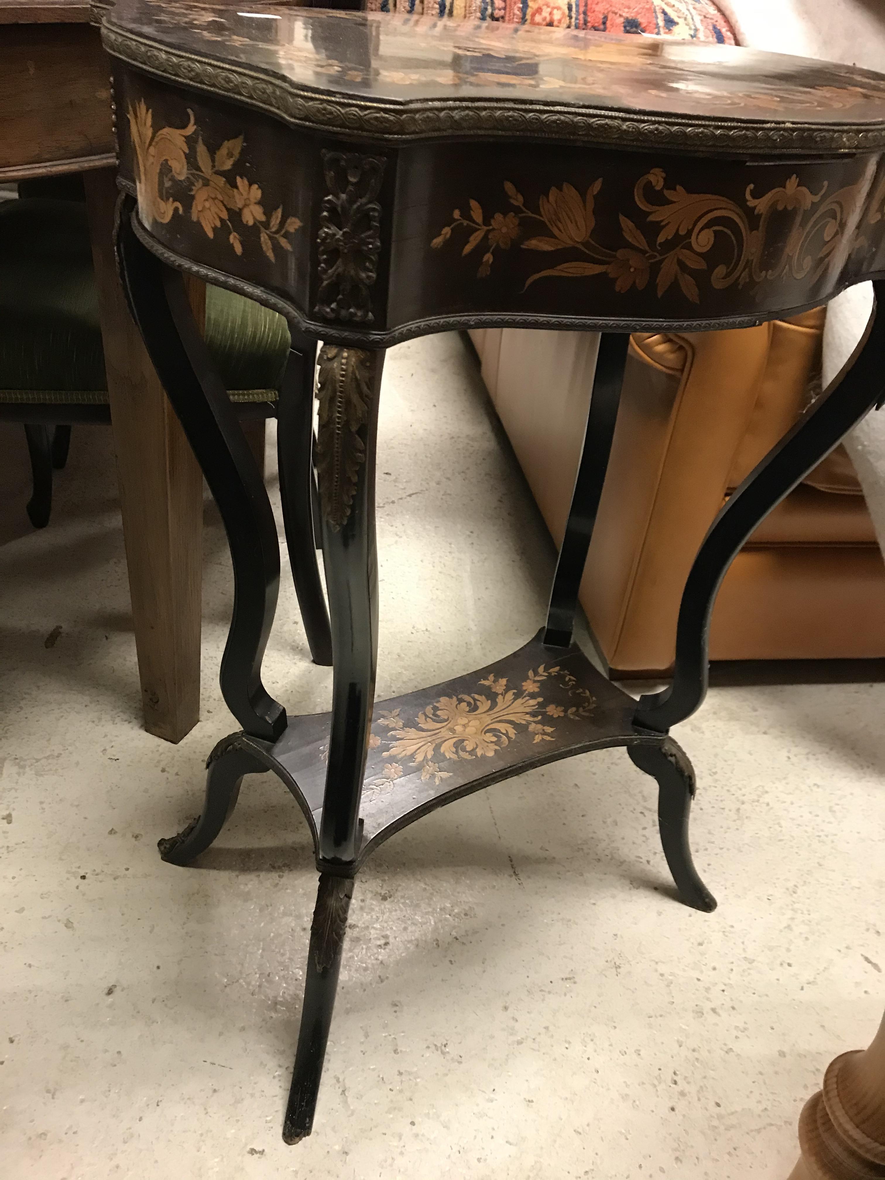 A late 19th Century ebonised and marquetry inlaid work table, - Image 17 of 23