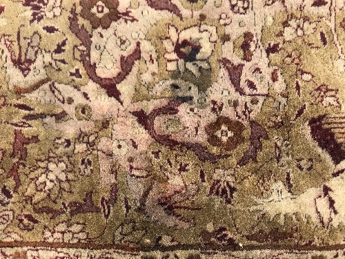 An early 20th Century Agra North India carpet with centre medallion on a wine-coloured ground, - Image 93 of 103