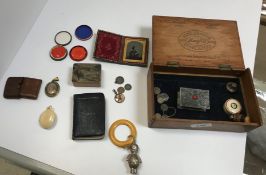 A box containing various objets de vertus including Victorian embossed cased daguerrotype portrait