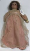 A Max Oscar Arnold Welsch bisque headed doll with composition body and arms,
