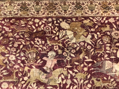 An early 20th Century Agra North India carpet with centre medallion on a wine-coloured ground, - Image 23 of 103