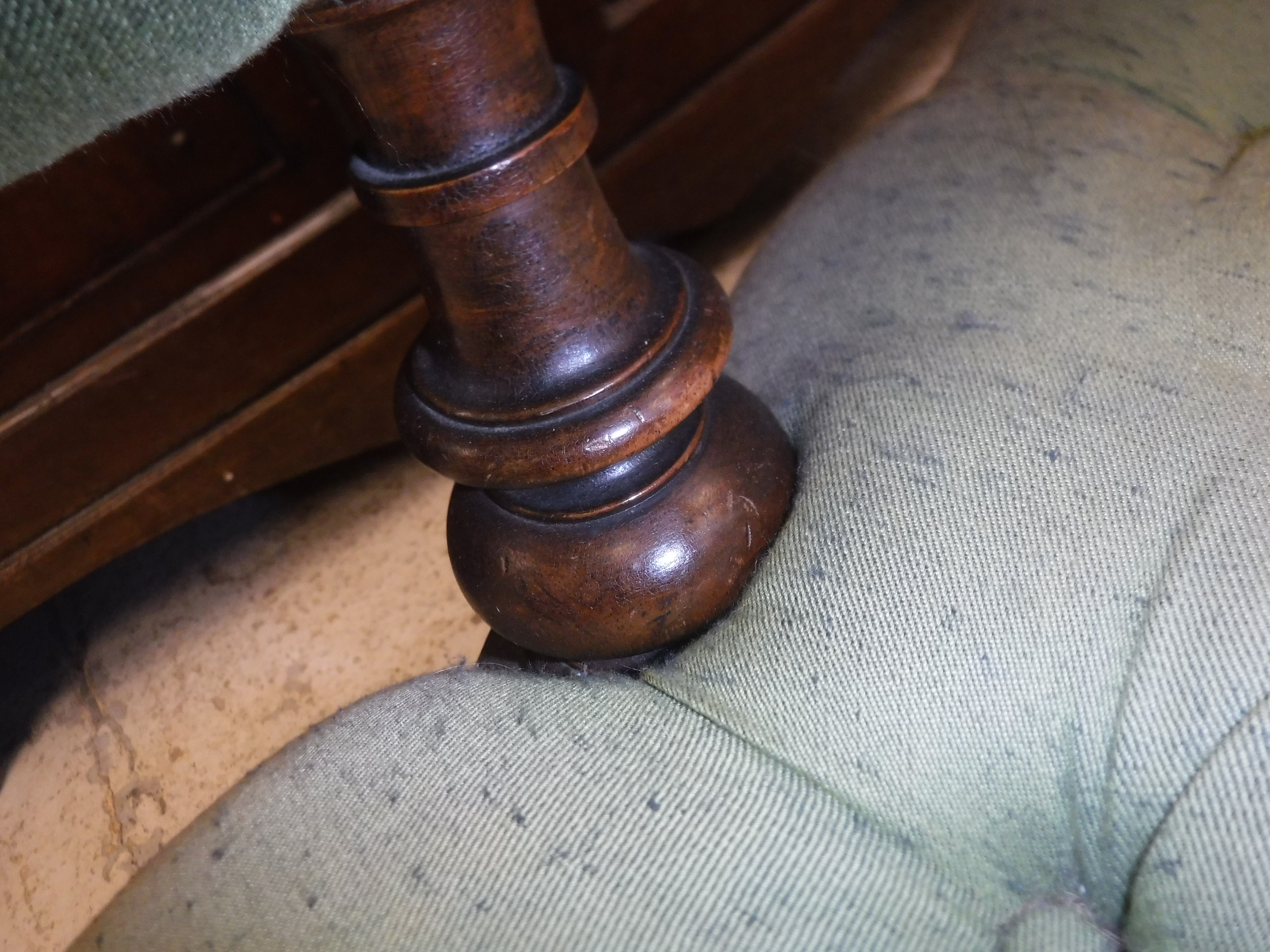 A Victorian green buttoned upholstered open arm chair on turned legs to castors, - Image 6 of 12