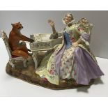 A 19th Century Meissen figure group as a fox playing the piano,