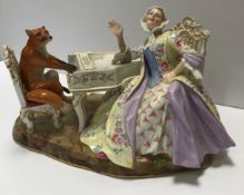 A 19th Century Meissen figure group as a fox playing the piano,