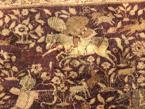 An early 20th Century Agra North India carpet with centre medallion on a wine-coloured ground, - Image 102 of 103