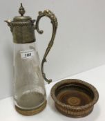A Victorian cut glass claret jug with plated mounts,