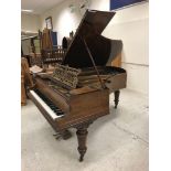 A circa 1900 rosewood cased grand piano,