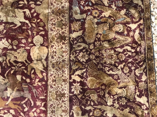 An early 20th Century Agra North India carpet with centre medallion on a wine-coloured ground, - Image 33 of 103