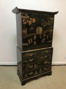 A 20th Century green lacquered and chinoiserie decorated cocktail cabinet in the Georgian style,