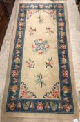 A circa 1950's Chinese rug, the central
