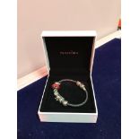 A Pandora bracelet and necklace with 22