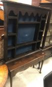 An oak dresser of small proportions in t