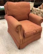 A modern upholstered scroll arm chair, a