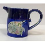 A Martina O'Leary fish decorated jug, de