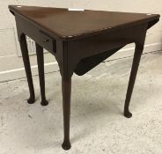 A George II mahogany corner table, the s