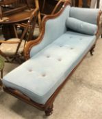 A Victorian mahogany framed chaise longu