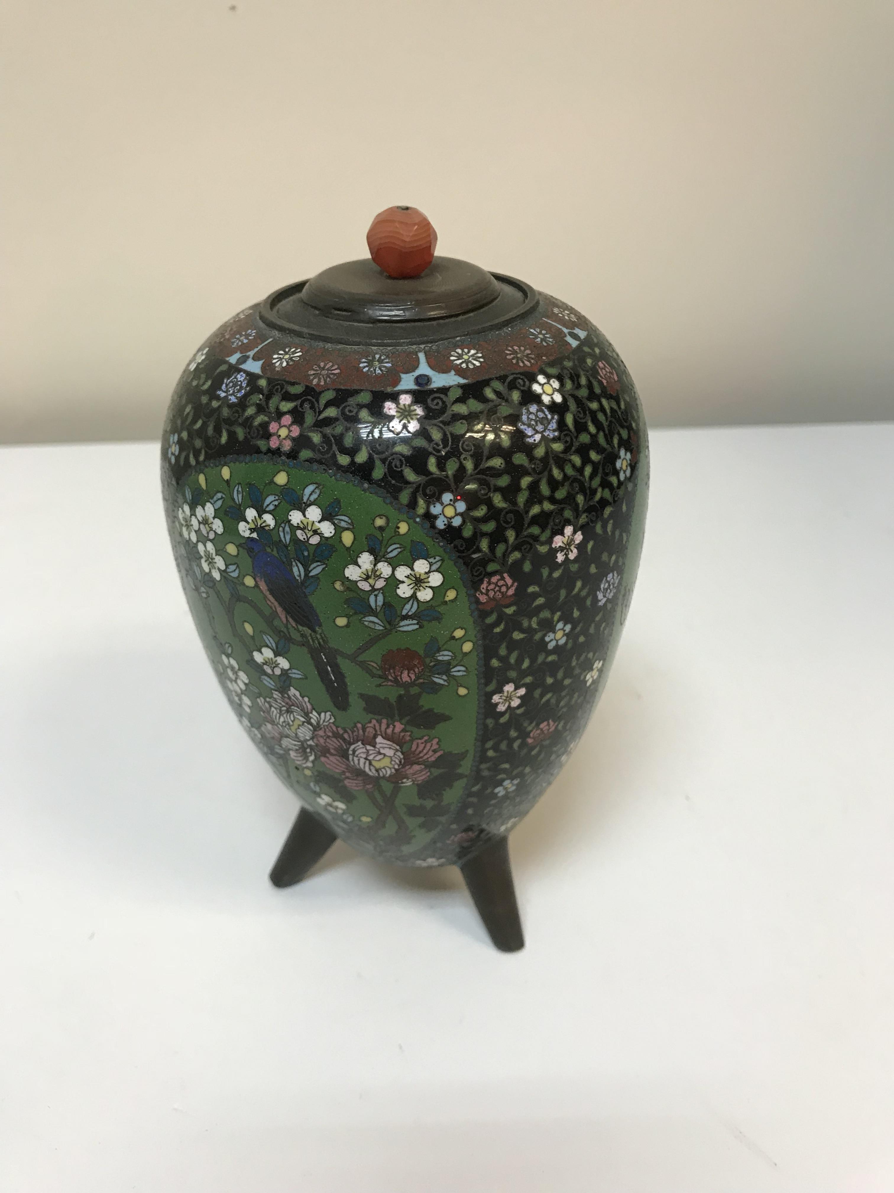 A chinese cloisonne vase with cover, the