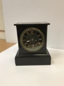 A mid 20th Century travel clock, the cir