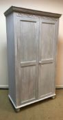 Two modern painted pine two door wardrob