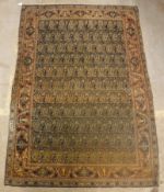 A Kashan rug, the central panel set with