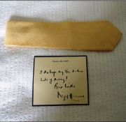 A Tie from Nigel Havers with autographed authentication card Donated by Stephen Segar