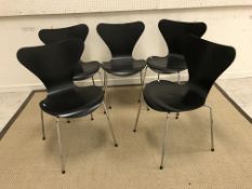 A set of five circa 2001 Fritz Hansen "Butterfly" black painted and chrome framed standard chairs