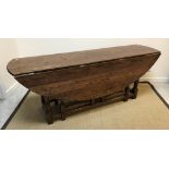 A 20th Century oak wake table in the 17th Century manner,