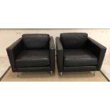 A pair of leather armchairs on tubular chrome supports, probably Habitat,
