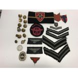 A World War II German Nazi veteran's arm badge / band, together with a further Nazi cloth badge,