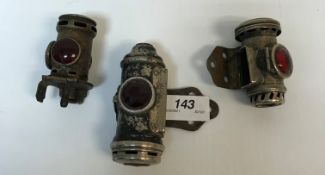 A collection of three early 20th Century vintage motorcyle / cycle rear lamps including a Joseph