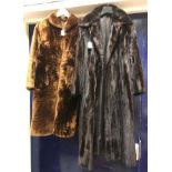 A dark brown mink full length coat with satin lining and inscribed "Julia" to the inside pocket,