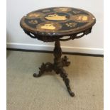 A 19th Century Black Forest tripod table,