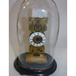 A brass clock,