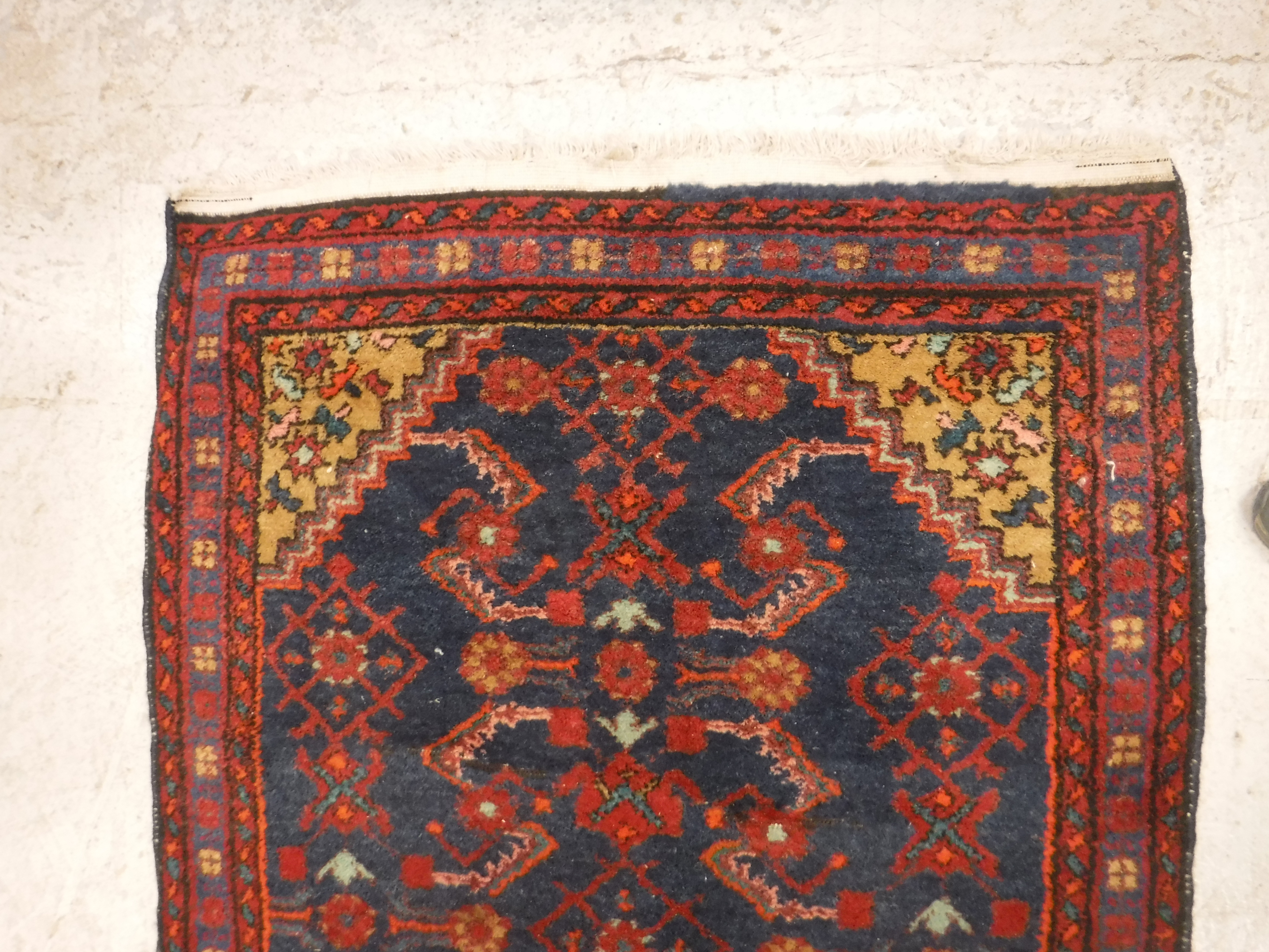 A Caucasian rug, the central panel set with stylised floral decoration on a blue ground, - Image 4 of 4