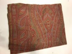 A Paisley throw in red and blue