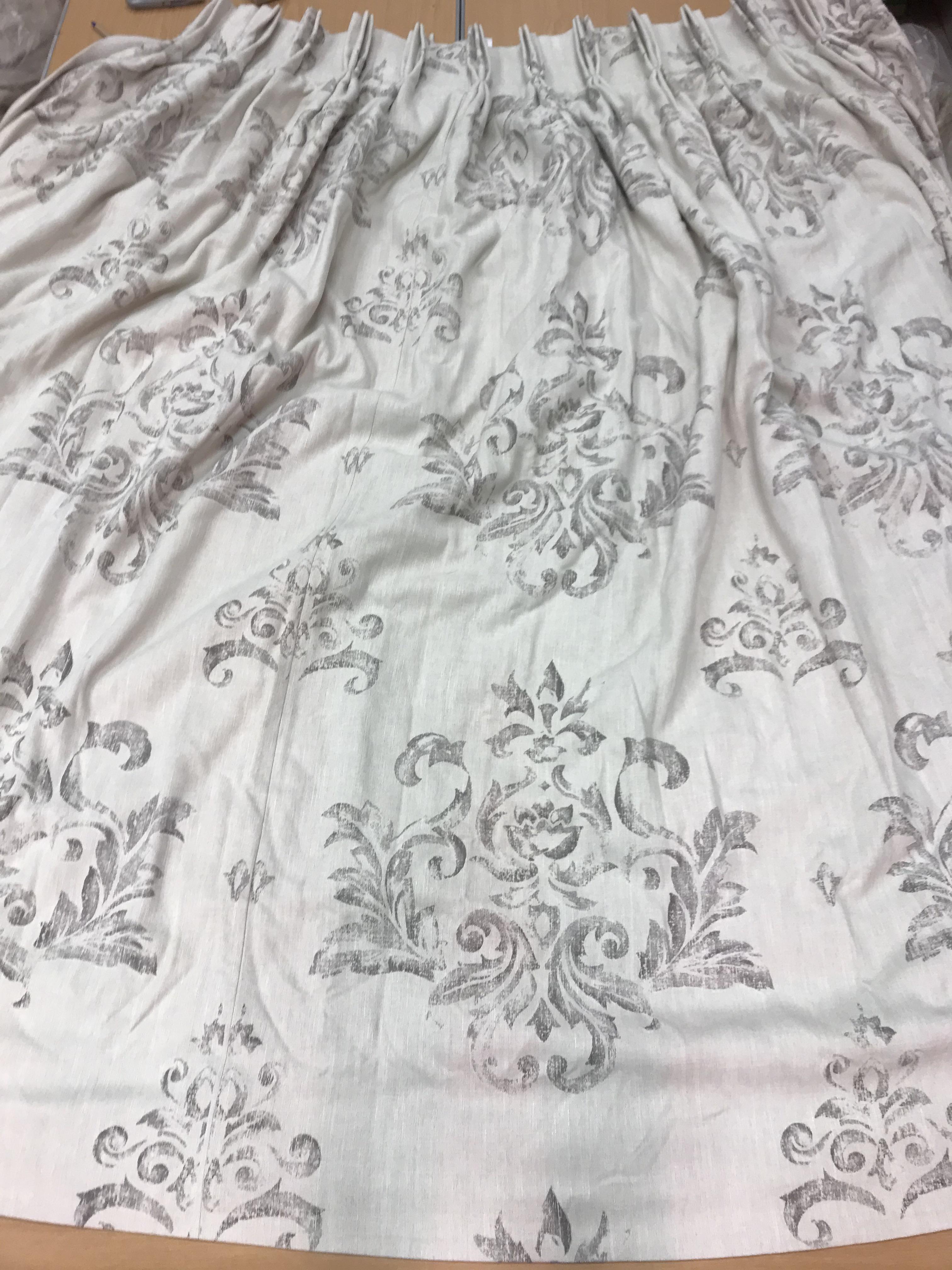 Two pairs of linen type grey ground foliate decorated interlined curtains,