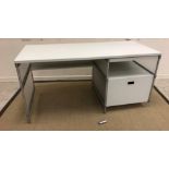 A Terence Conran tubular framed white laminated single pedestal desk,