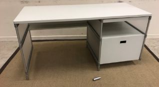 A Terence Conran tubular framed white laminated single pedestal desk,