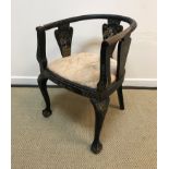 An early to mid 20th Century black lacquered and chinoiserie decorated yoke back chair in the