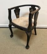 An early to mid 20th Century black lacquered and chinoiserie decorated yoke back chair in the