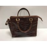 A Fratelli Rossetti brown crocodile skin handbag,