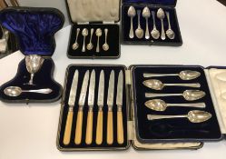 A cased set of six silver Georgian grapefruit spoons, initialled "J" and with shell shaped bowls,