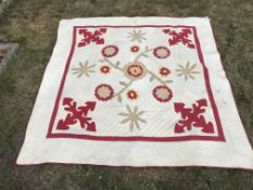 A vintage American quilt of red and cream design CONDITION REPORTS size 180cm long x